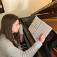 Aimee Nolte working in custom music notebook